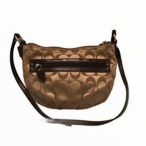 Coach signature brown swingpack crossbody bag